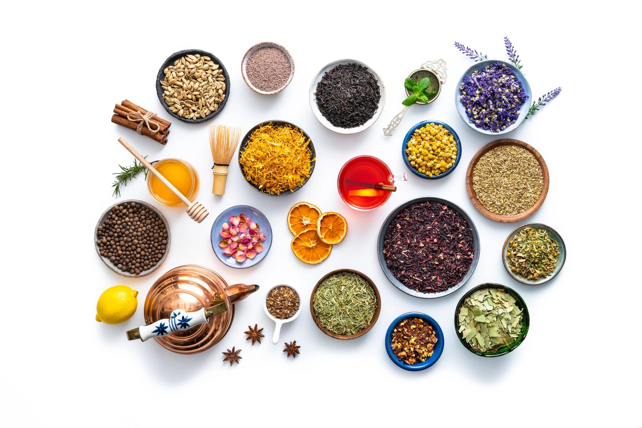 Herbal tea and dried botanicals arranged neatly, suggesting self-paced wellness resources